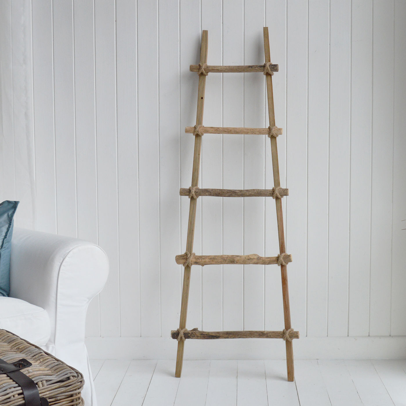 Its tall, slim shape adds height to neutral interiors without taking up much floor space.