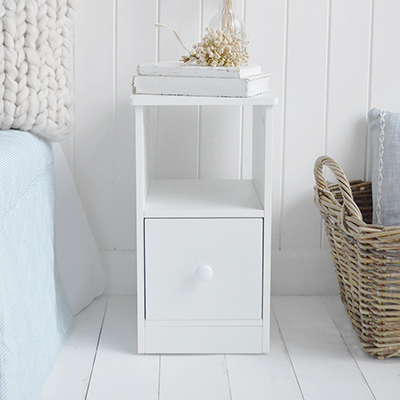 This 25cm wide narrow bedside table is designed for coastal and neutral bedrooms that need slim, practical storage.