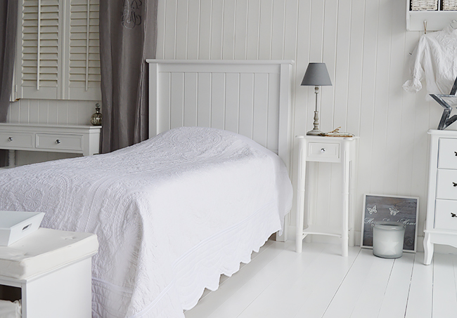 A Narrow Tall White Bedside Table With Drawer And Silver Handle New England White Bedroom Furniture