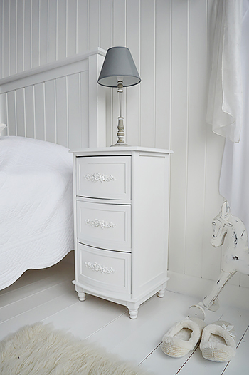 A nightstand in Rose White 